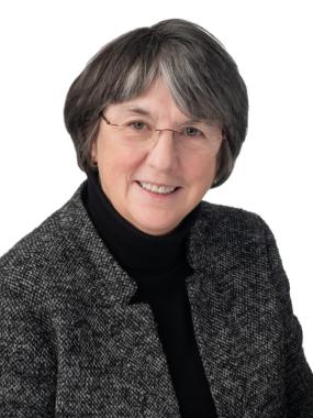 Portrait of Heather Cruickshanks, Employer Representative, Smiling in a black blazer.